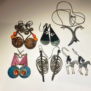 5 pierced earrings and a necklace